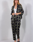PANTALONE CARROT RASO POIS