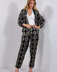 PANTALONE CARROT RASO POIS