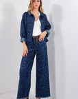 JEANS MACULATO FRANGE