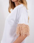 MAGLIA PIUMETTE MANICHE