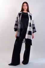 PONCHO QUADRI